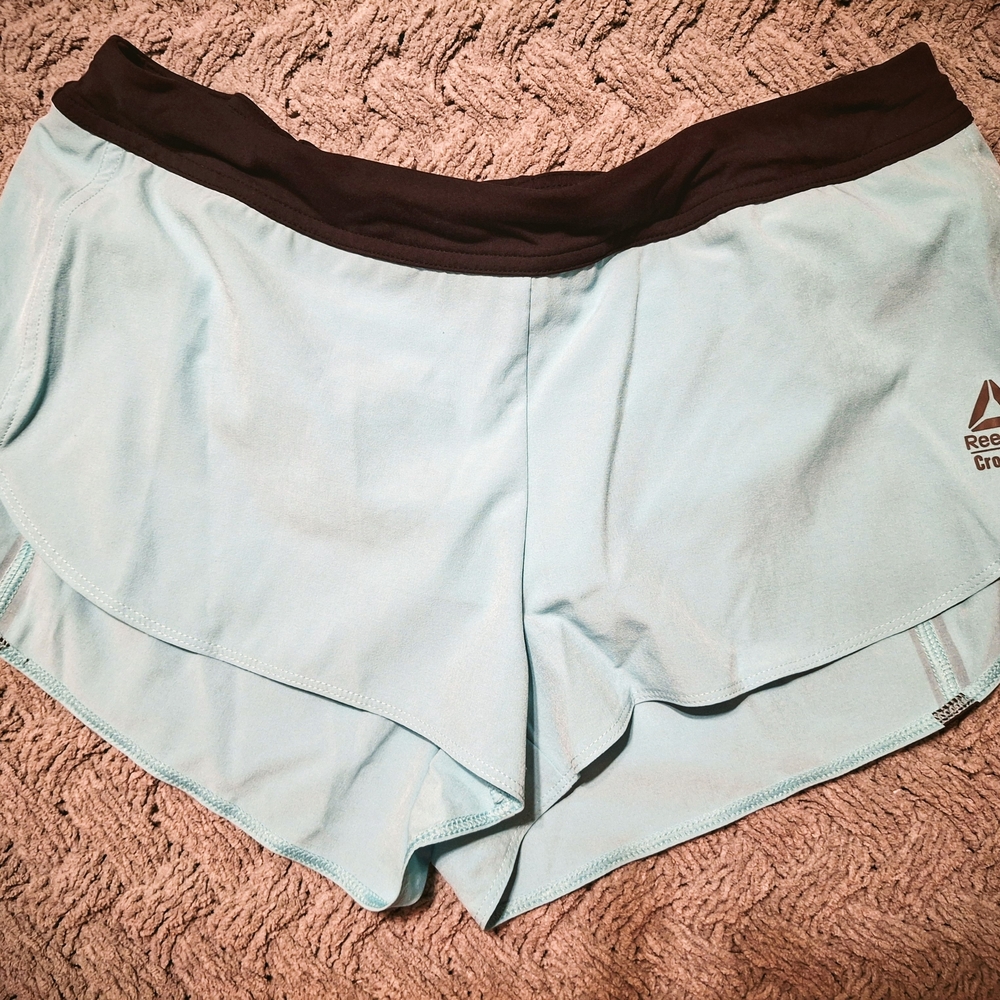 Reebok Women’s Aqua Athletic Shorts with Black Waistband